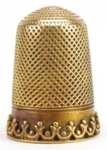 Unmarked gold thimble, tests as 15ct gold, 2.3cm high, 6.2g : For further information on this lot