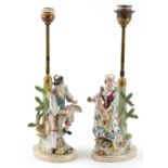 Dresden, pair of German floral encrusted porcelain table lamps in the form of a shepherd and