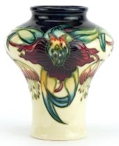 Moorcroft pottery vase hand painted in the Anna Lilly pattern, 14cm high : For further information
