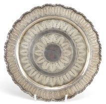 Persian white metal circular tray with engraved decoration, impressed marks to the base, 21.5cm in