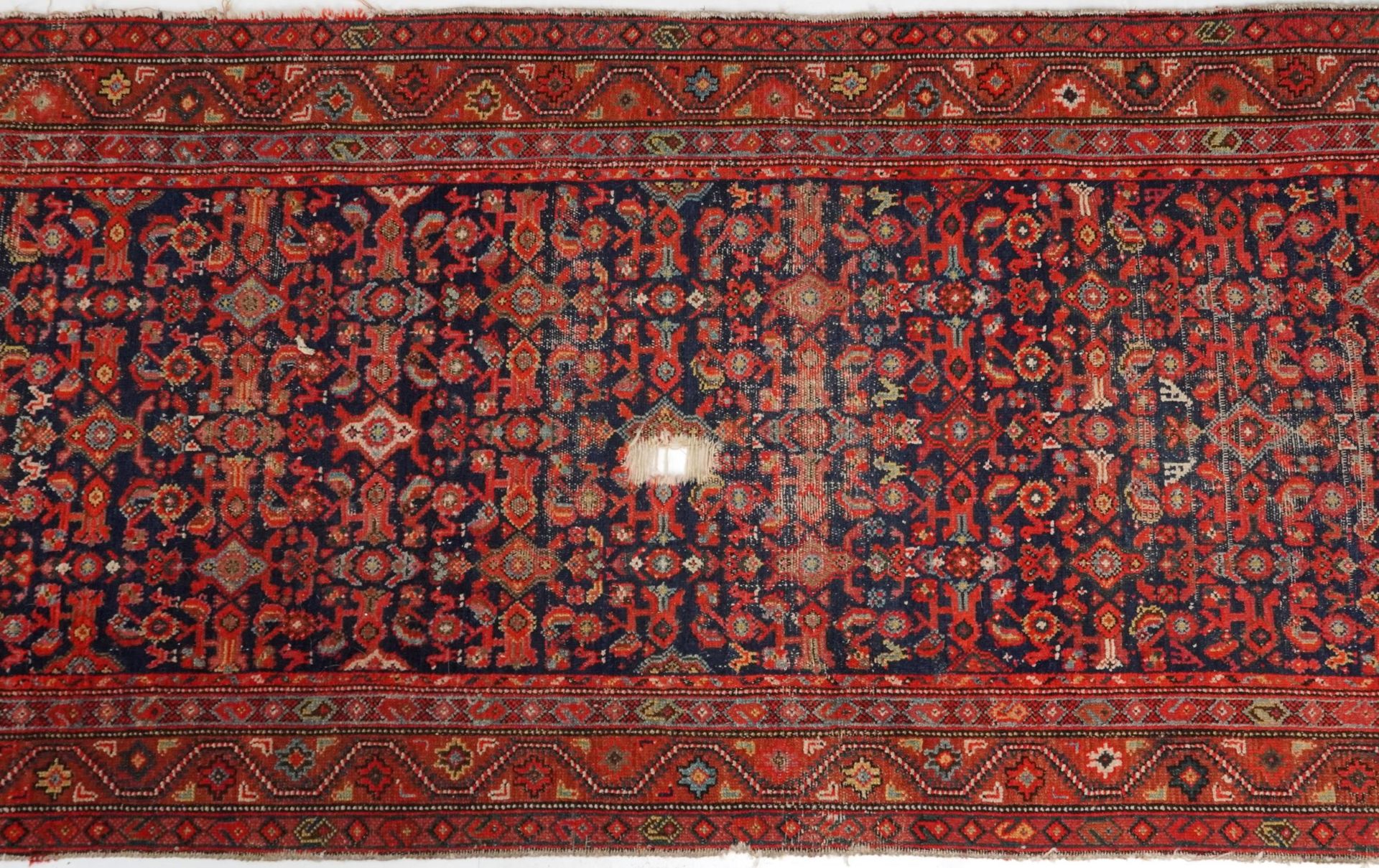 Rectangular Persian red and blue ground carpet runner having an allover floral repeat central field, - Bild 4 aus 6