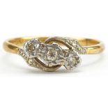 18ct gold and platinum diamond three stone crossover ring, size S, 3.0g : For further information on