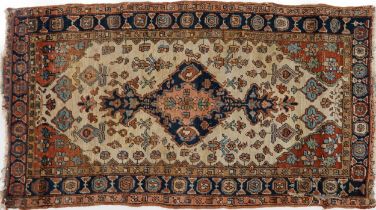 Rectangular Persian brown ground rug having a repeat diamond central field, 270cm x 157cm : For