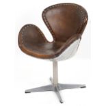 Timothy Oulton aviation interest Devon Spitfire swivel chair with brown leather upholstery, 90cm