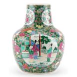 Chinese Canton porcelain vase hand painted in the famille rose palette with panels of figures and