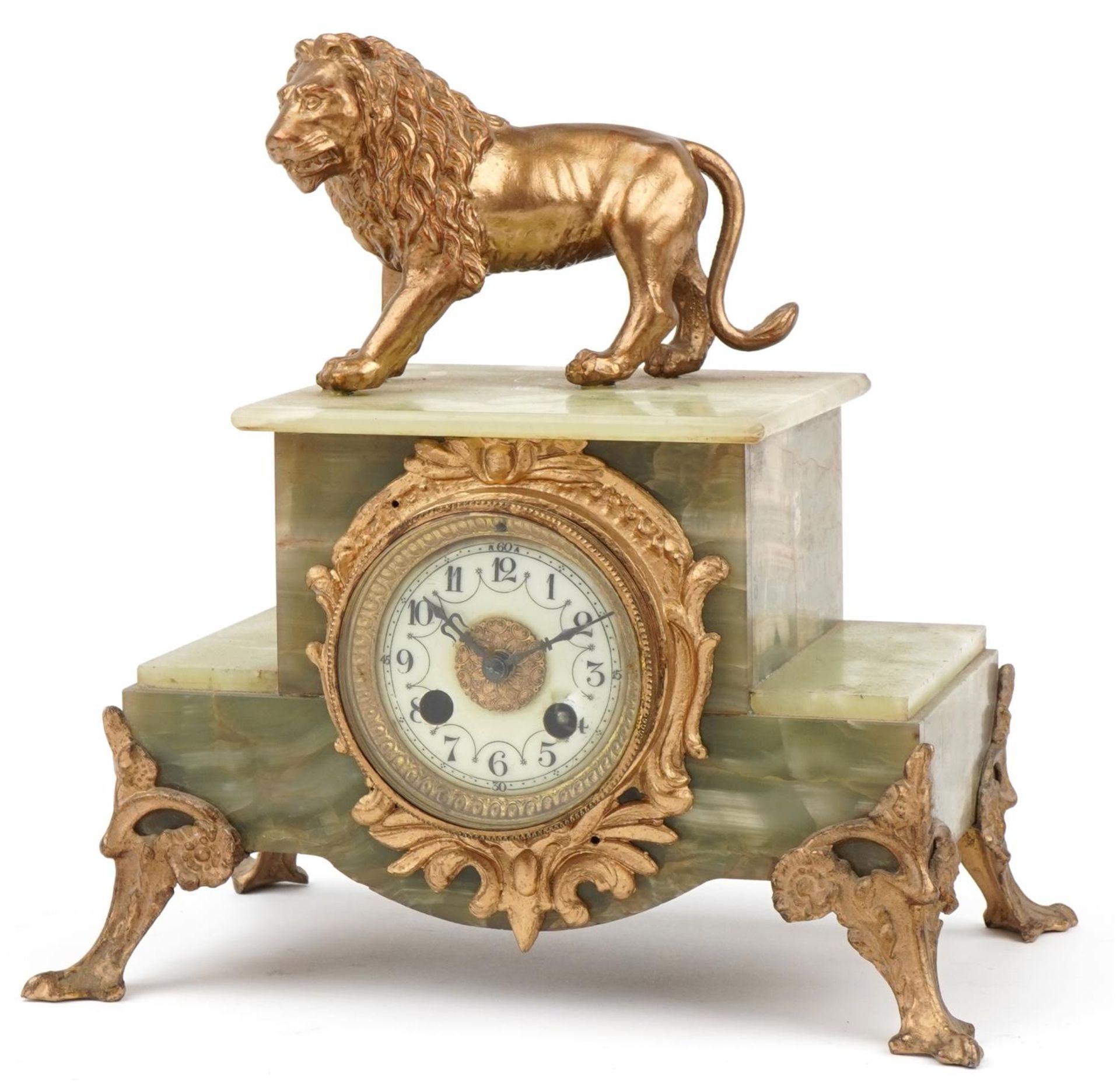 Japy Freres, French 19th century style onyx and gilt metal mantle clock surmounted with a lion,