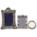 Two Victorian and later silver mounted photo frames and a silver plated easel photo frame, one
