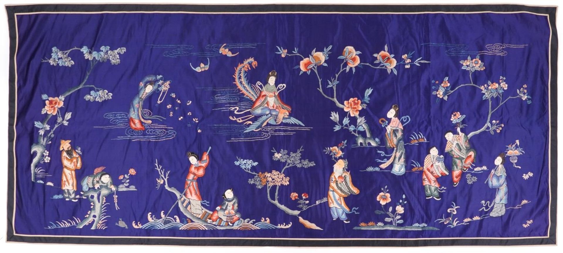 Large Chinese silk textile embroidered with an emperor amongst Geishas and figures, one riding a