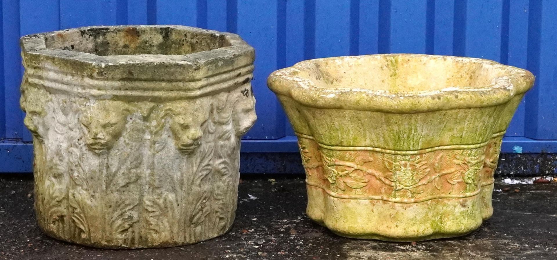 Two garden stoneware garden planters, one decorated with lion heads, the largest 34cm high : For