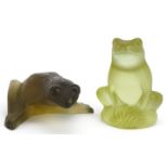 Lalique, two French frosted green glass frog paperweights, one with paper label, each etched Lalique