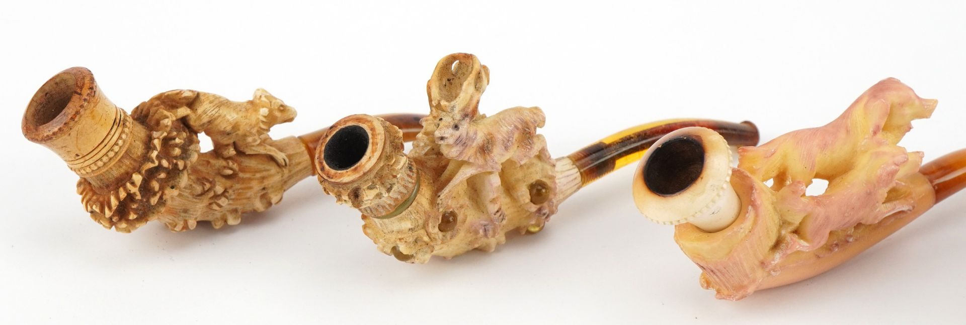 Five antique Meerschaum smoking pipes housed in fitted cases, each carved with animals, four with - Image 3 of 9