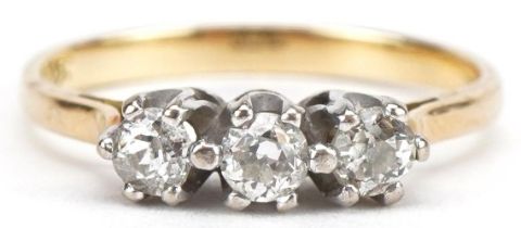 Unmarked gold diamond three stone ring, tests as 18ct gold, total diamond weight approximately 0.