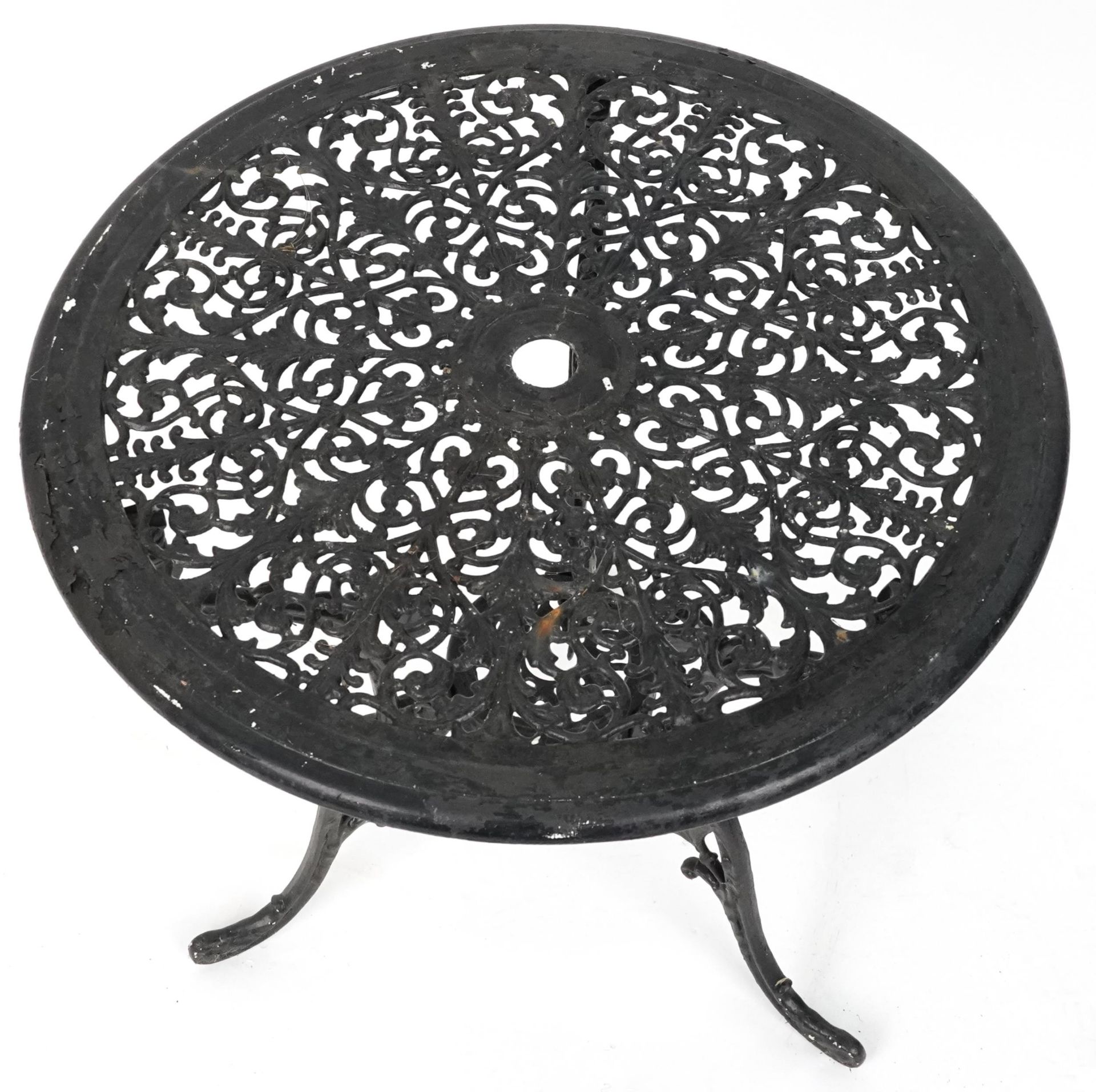 Black painted cast metal circular garden table with three chairs, 70.5cm high x 69cm in diameter : - Image 6 of 7