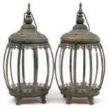 Pair of bronzed hanging lanterns with glass panels on paw feet, each 48.5cm high : For further