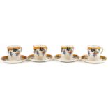 Four Foley china coffee cans with saucers decorated with stylised fruit, 6cm high : For further