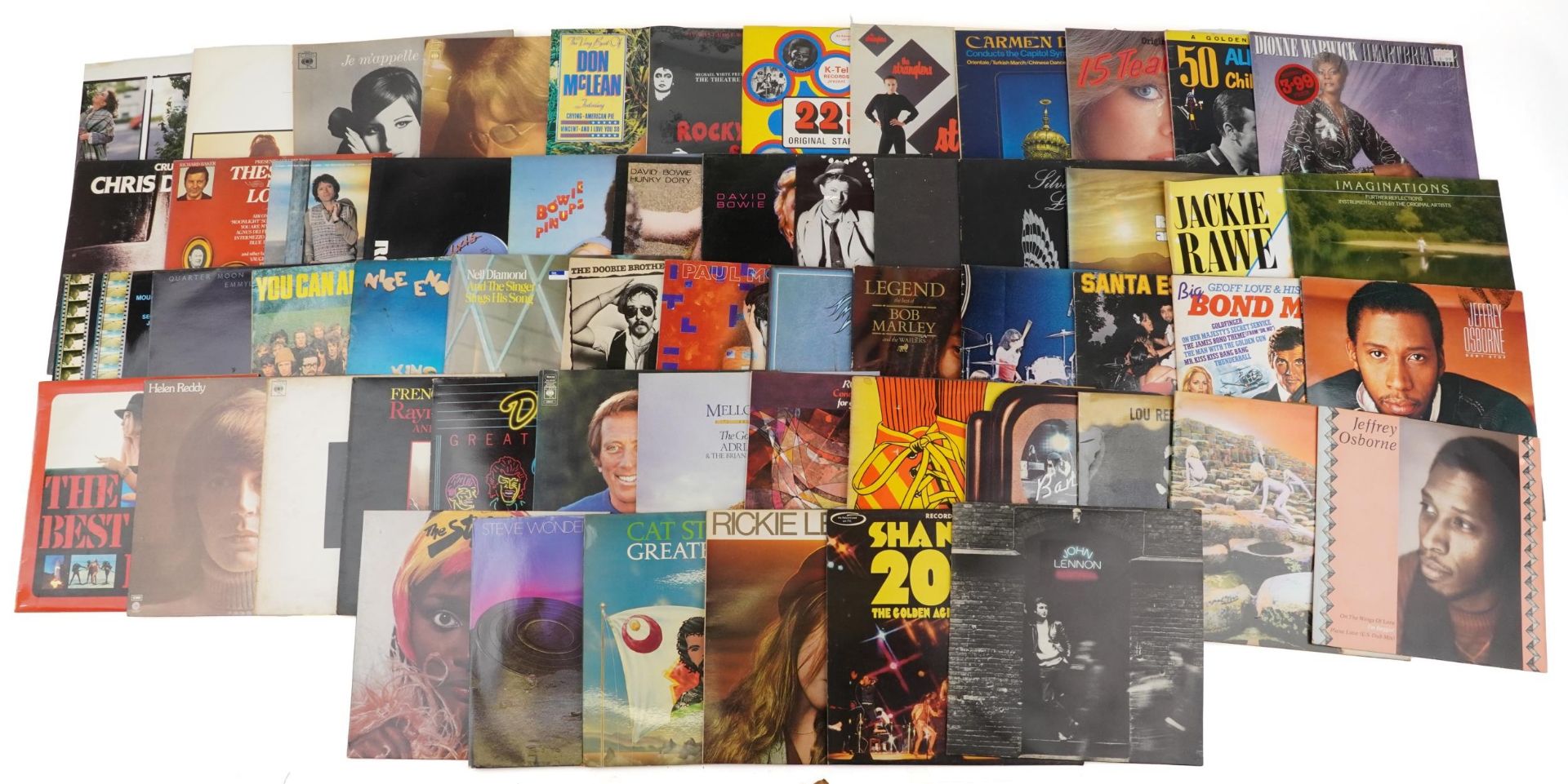 Vinyl LP records including The Eagles, Paul McCartney, The Doobie Brothers, David Bowie, Elton John,