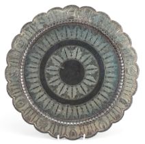 Malaysian white metal circular tray embossed with heraldic crests, 35.5cm in diameter, 800.0g