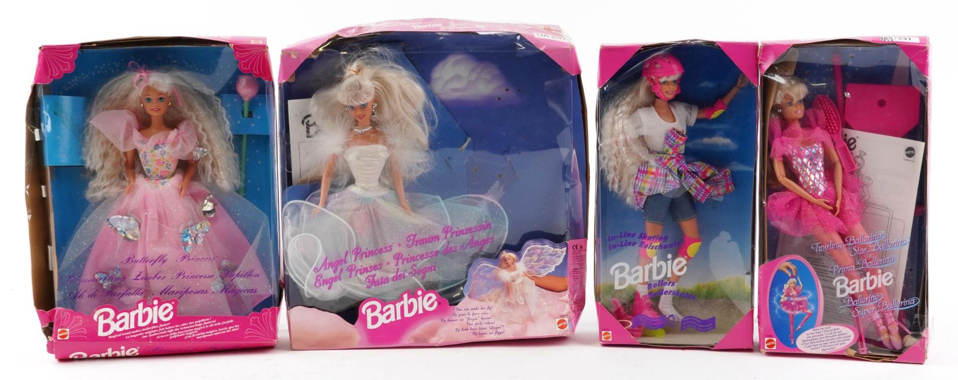Four vintage Barbie dolls with boxes by Mattel including Ballerina and Angel Princess, comprising