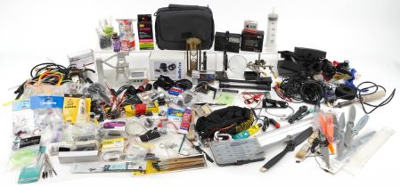 Collection of radio controlled mechanics and accessories including battery packs, wires and