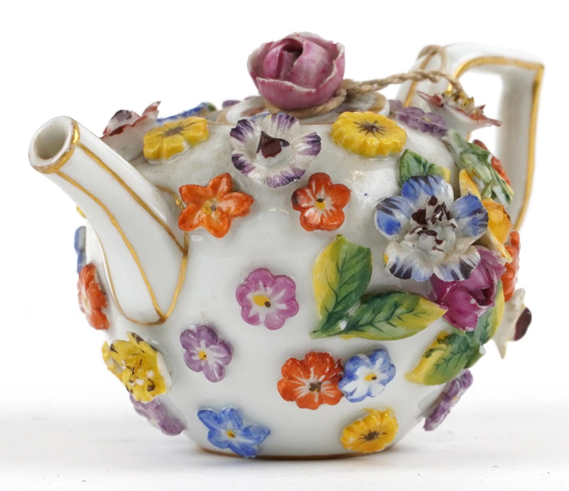 Meissen, 19th century German porcelain floral encrusted miniature teapot, 9.5cm in length : For