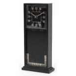 Art Nouveau style ebonised mantle clock in the manner of Charles Rennie Mackintosh with applied