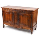 Provincial French fruit wood sideboard carved with flowers fitted with a drawer above a cupboard