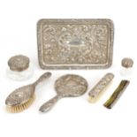 Edwardian silver dressing table tray and six silver mounted dressing table items including hand