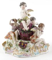Manner of Meissen, 19th century porcelain 'Vintner' centrepiece modelled in the form of three