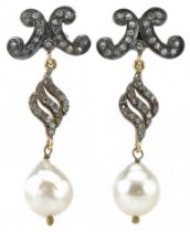 Pair of antique unmarked gold diamond and Baroque pearl drop earrings, tests as 18ct gold, 3.7cm