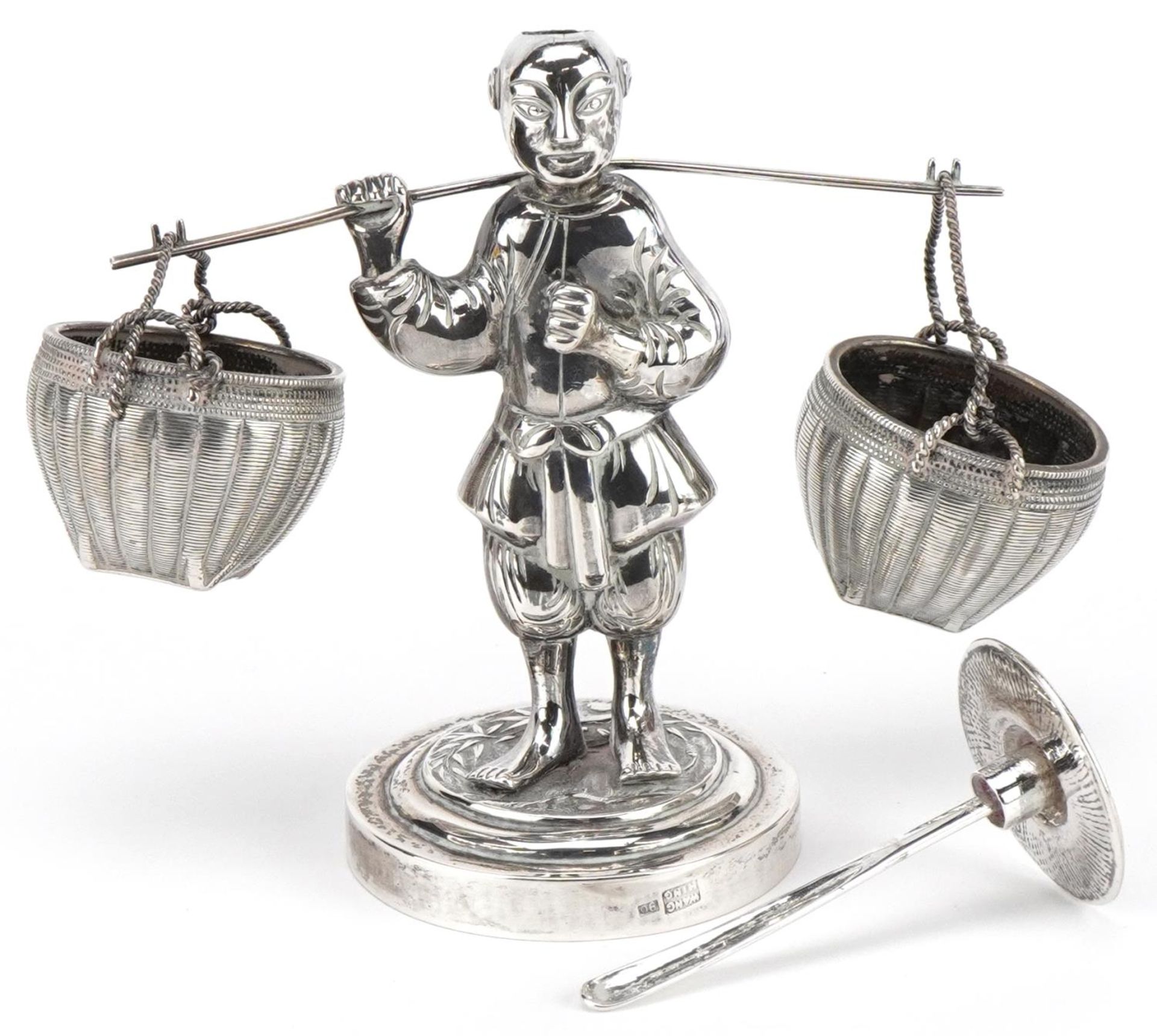 Wang Hing, Chinese export silver cruet in the form of a Chinaman carrying baskets, 10.5cm high,
