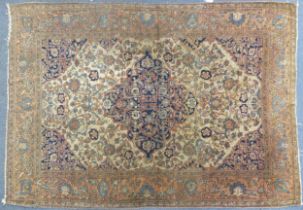 Rectangular beige and blue ground rug having an all over floral design, 205cm x 143cm : For