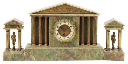 Gustav Becker, German onyx architectural mantle clock with figural garnitures and enamelled