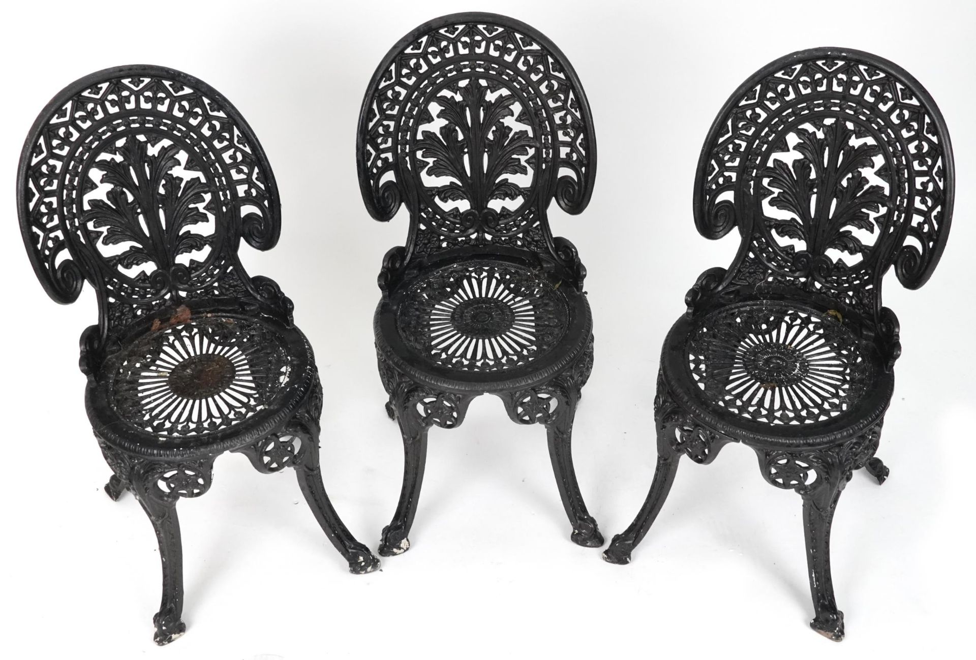 Black painted cast metal circular garden table with three chairs, 70.5cm high x 69cm in diameter : - Image 3 of 7