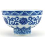 Chinese blue and white porcelain footed bowl hand painted with flower heads amongst scrolling