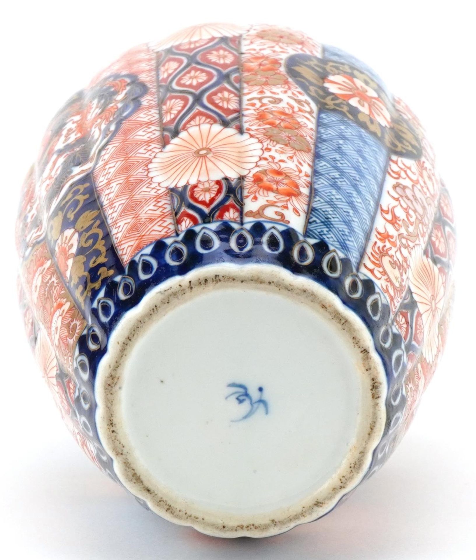 Japanese Imari porcelain fluted vase hand painted with flowers and stylised roundels enclosing - Image 6 of 7