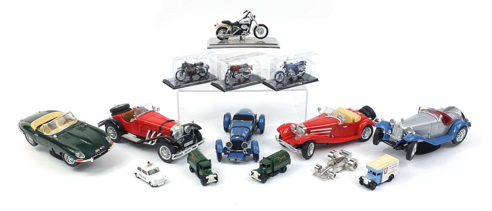 Group of collector's diecast vehicles and motorbikes including Burago and Maisto : For further