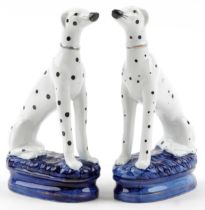 Pair of Staffordshire pottery Dalmatians, each 22cm high : For further information on this lot