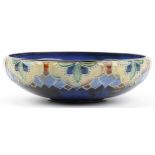 Royal Doulton, Art Nouveau stoneware bowl decorated in low relief with stylised flowers, impressed