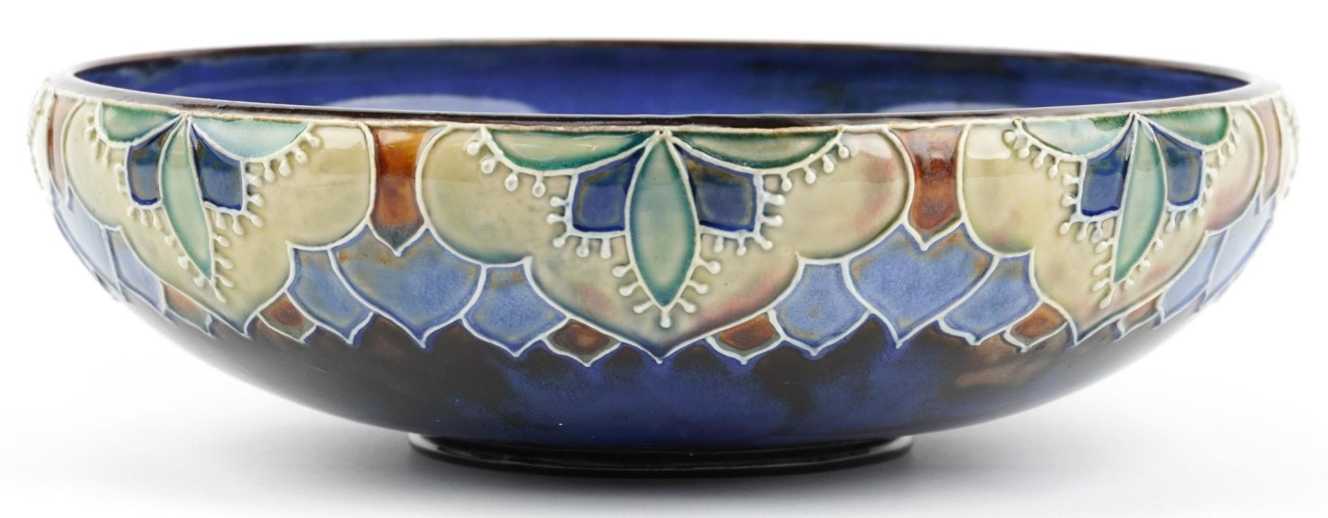 Royal Doulton, Art Nouveau stoneware bowl decorated in low relief with stylised flowers, impressed