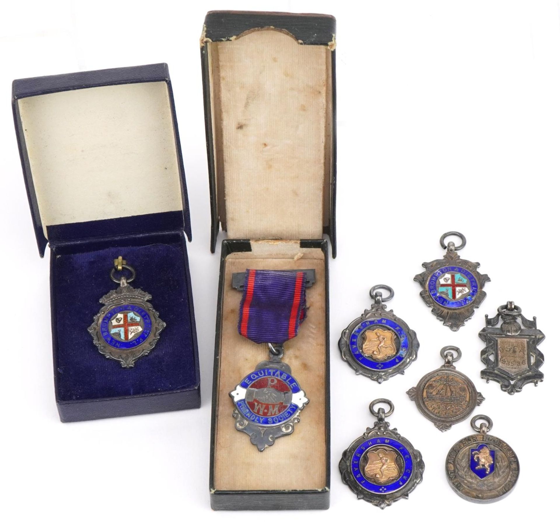 Seven silver sports jewels, six with enamel including Equitable Friendly Society, New Brompton