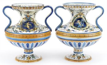 Gien, pair of 19th century French faience glazed Maiolica twin handled vases hand painted with