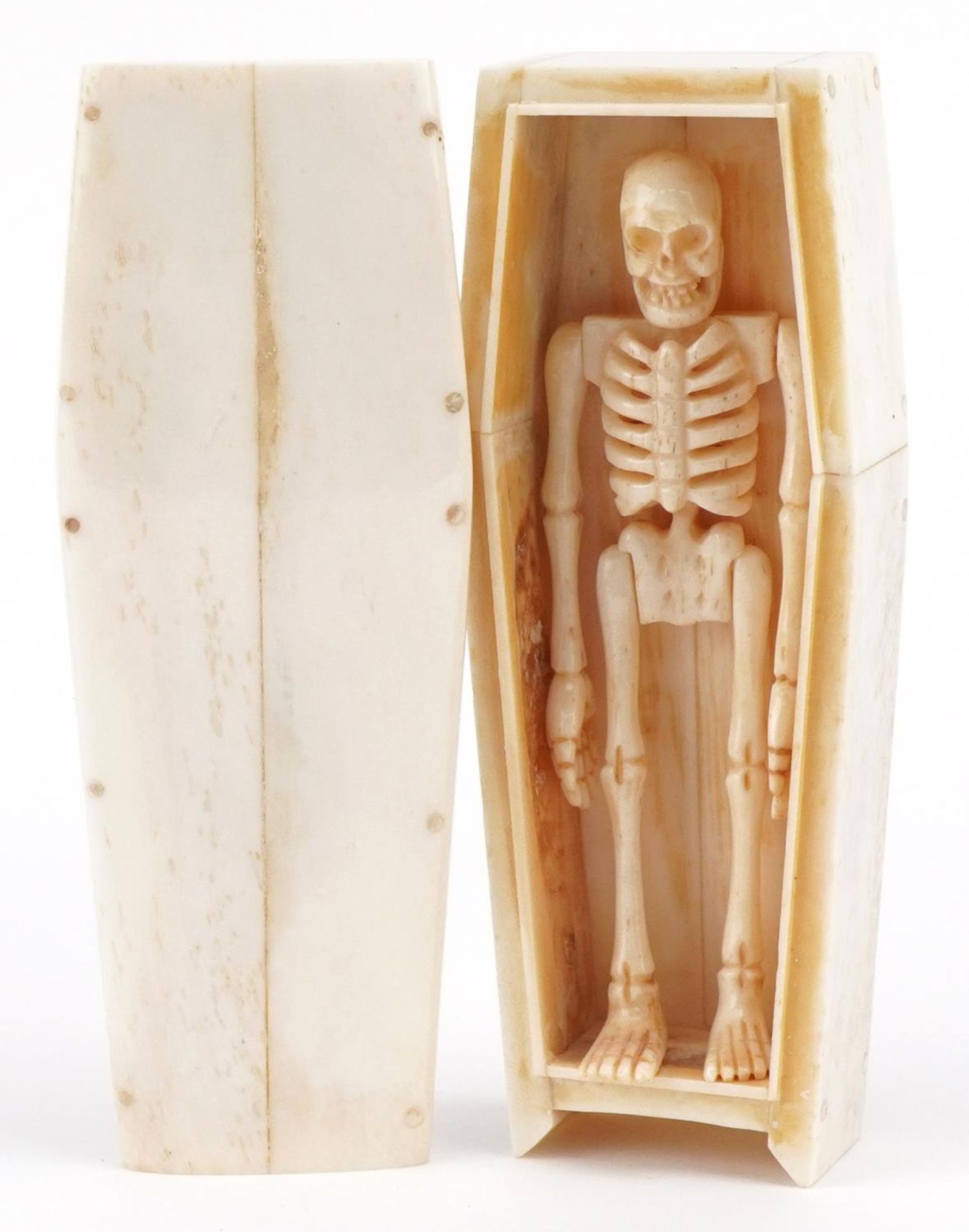 Scrimshaw style carved bone skeleton housed in a bone coffin with lift off lid, the coffin 11.5cm in - Image 4 of 5