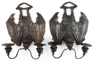 Pair of Art Nouveau style patinated bronze bat design wall sconces, each 34cm high : For further