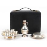 Late 19th/early 20th century silver plated holy communion set housed in a velvet and silk lined