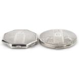 Two Art Deco style silver engine turned compacts, the largest 6.8cm in diameter, total 152.0g :