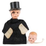 Vintage Edgar's Bergen's Charlie McCarthy glove puppet and an Armand Marseille bisque doll's head,