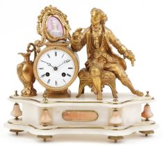 19th century French gilt metal and onyx figural mantle clock striking on a bell with circular dial