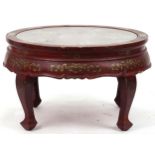 Chinese red lacquered chinoiserie centre table with inset glass top, mother of pearl and hardstone