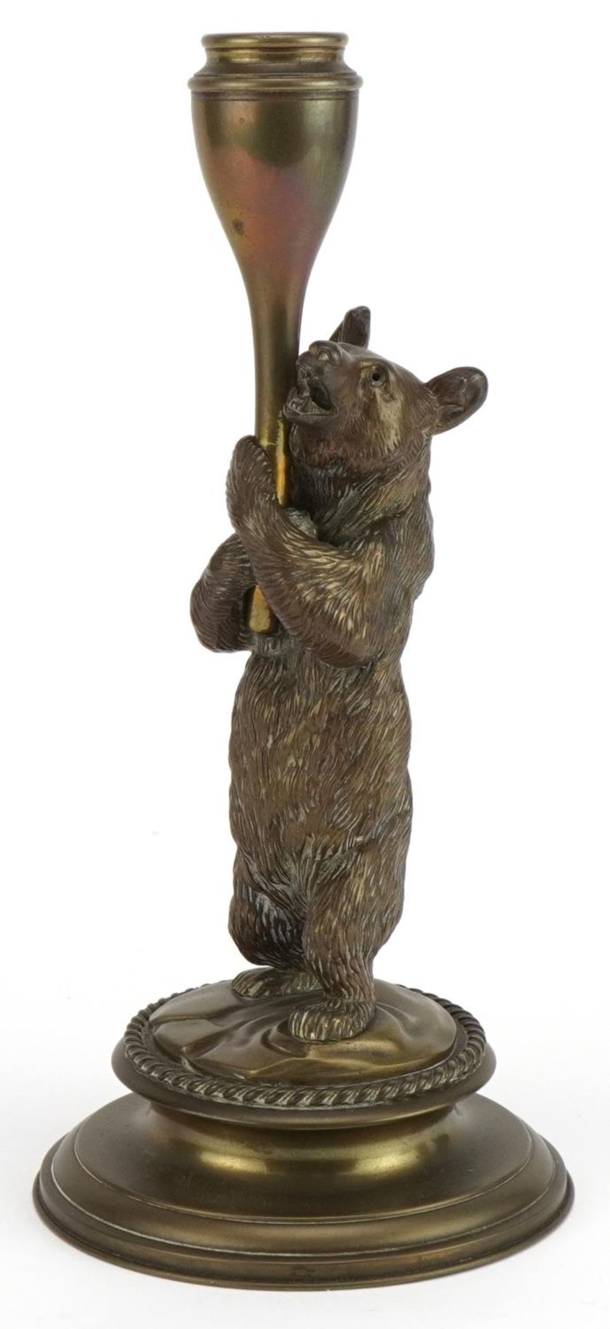 Victorian brass candlestick in the form of a bear hugging a trunk, 23cm high : For further