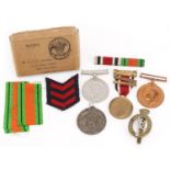 British military World War II militaria including George VI Faithful Service medal awarded to Thomas